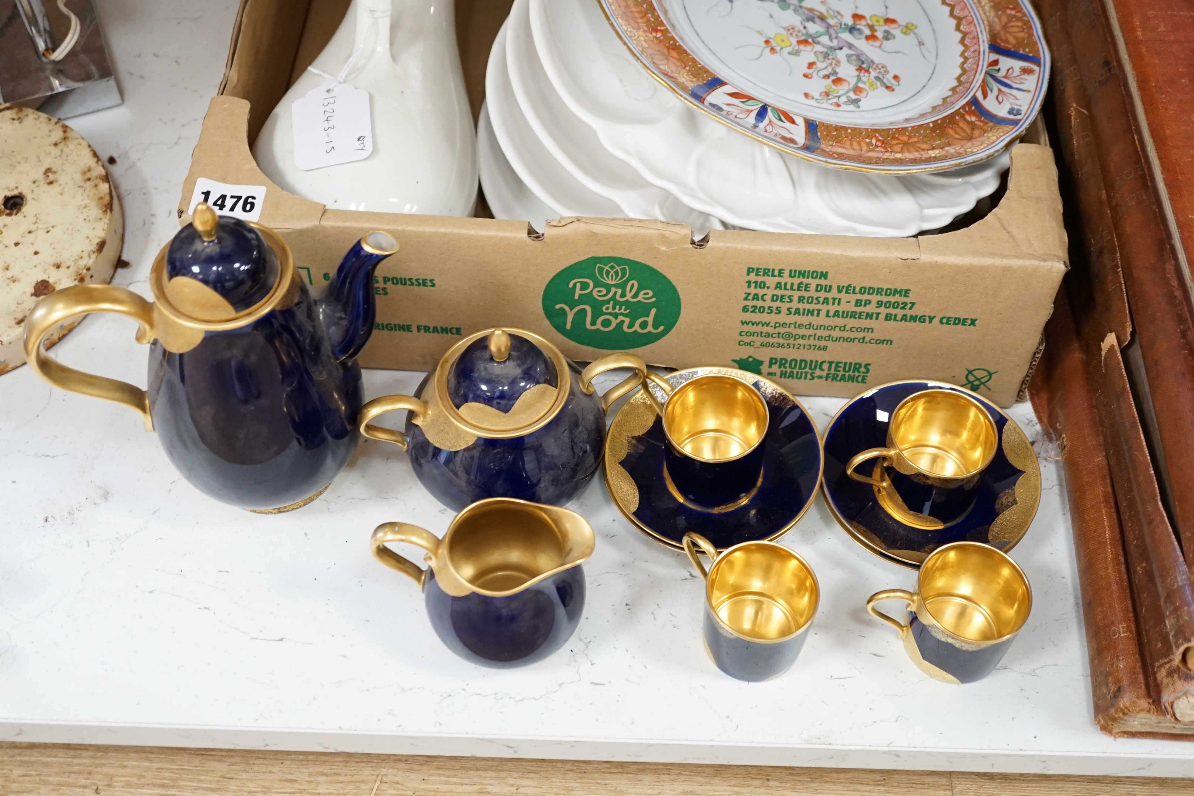 A collection of various china including Belleek cup and saucer, a Worcester cup and saucer and a set of eight circular dishes, largest 25cm in diameter